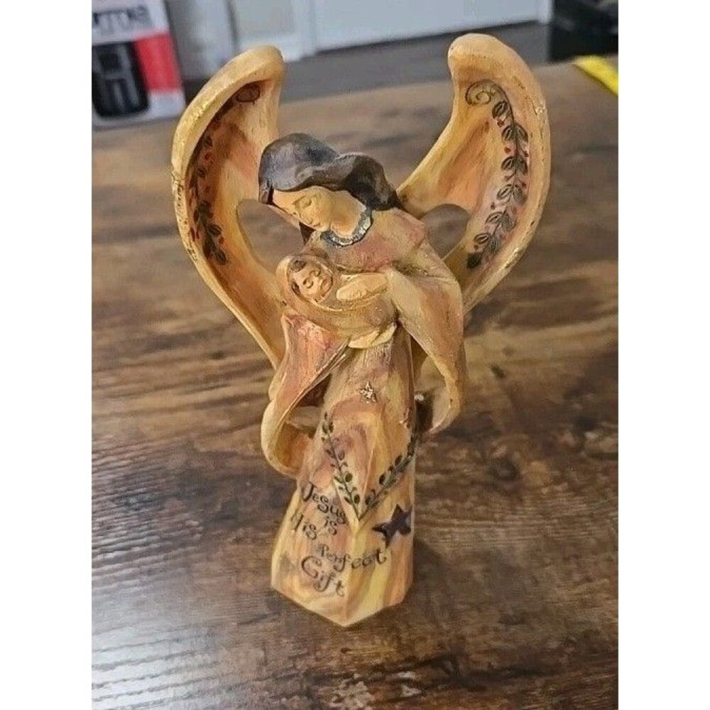 Christmas Angel Holding the Baby Jesus Figurine